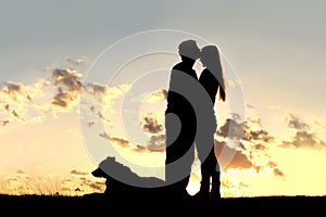 Loving Couple Kiss at Sunset Silhouette