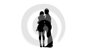 Loving couple kisses and dances together. Silhouette. White background. Slow motion