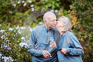 Loving couple kissing in garden