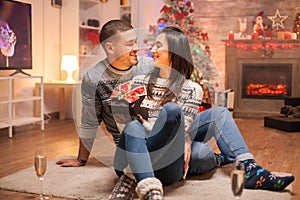 Loving couple with magic gift box