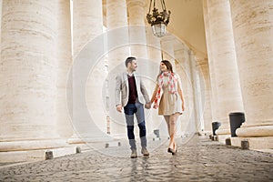 Loving couple, man and woman traveling on holiday in Rome,