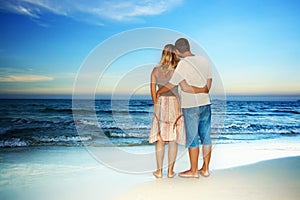 Loving couple near the ocean