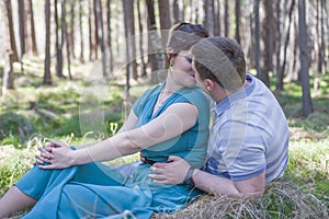 Loving couple resting on the nature.