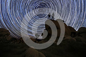 Loving Couple Silhouette Under the Stars at Night