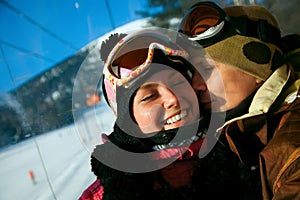 Loving couple at a ski resort.