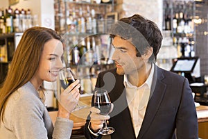 Loving couple takes a drink in restaurant