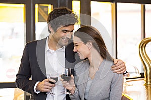 Loving couple takes a drink in restaurant