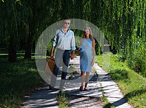 Loving couple walking hand-in-hand