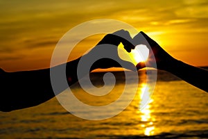 Loving couple on wedding day on tropical beach and sunset