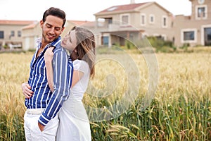 Loving couple, woman hugging her boyfriend