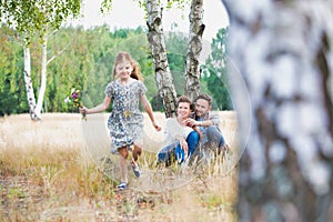 Loving family together in a park, field or woodlands