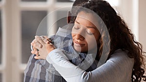 Loving girlfriend hug boyfriend happy to reconcile after fight