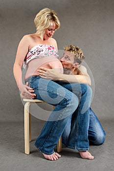 Loving happy couple pregnant woman with her husband