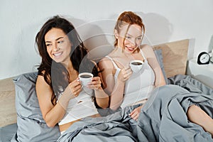 Loving lesbian couple in elegant attire