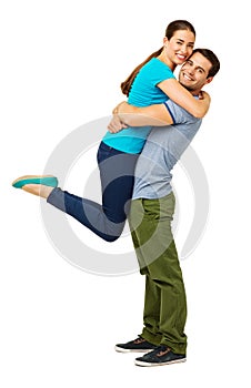 Loving Man Lifting Woman Against White Background