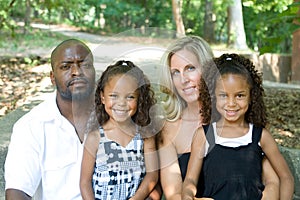 A loving mixed race family photo