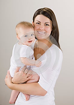 Loving mother holding baby