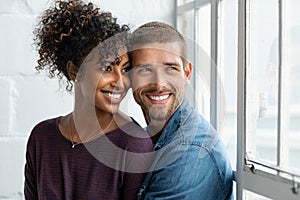 Loving multiethnic couple thinking