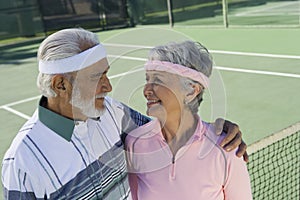 Loving Senior Couple At Tennis Court