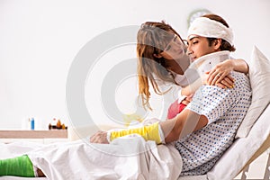 The loving wife looking after injured husband