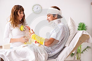 The loving wife looking after injured husband