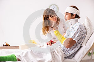 The loving wife looking after injured husband