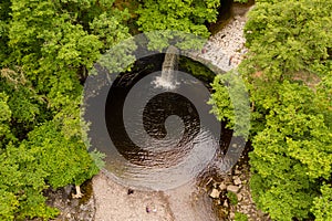 Low aerial view of a picturesque waterfall