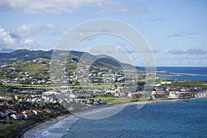 Low aerial view of resorts and beaches in St Kitts.