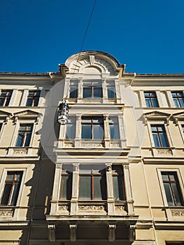 Low angle of an antique building exterior in Gorlitz, Germany against blue sky