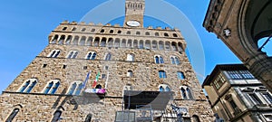 Low angle of the Arnolfo Tower in Italy on a sunny day photo