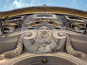 Low angle of the beautiful ornaments of a tenant building in Katowice, Poland.