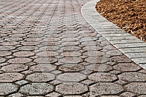 Low angle brick paver driveway