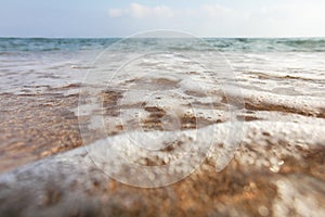 Low angle, camera on the ground, lens covered with water drops t