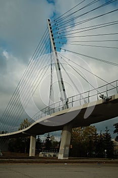 Low angle of the Chords Bridge, the Bridge of Strings in Jerusalem against the cloudy blue sky