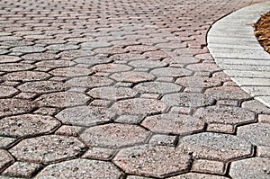 Low angle close up of brick paver driveway