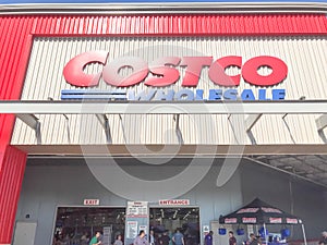 Low angle close-up logo of Cosco warehouse store facade in Churchill Way, Dallas