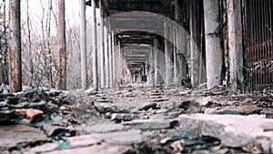 Low angle dolly into an old abandoned tunnel