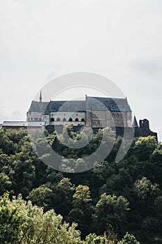 Low angle over the greenery view of Vianden Castle, Luxembourg