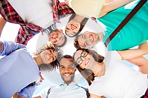 Low angle portrait of six international students with beaming sm