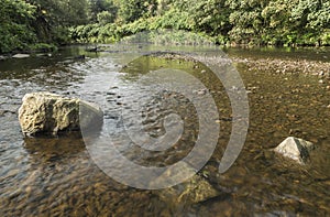 Low angle river view at Moses Gate Country Park, near Bolton