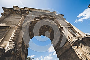 Low angle shot of the Arch of Titus Rome Italy