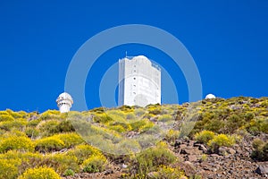 Low-angle shot of the astrophysical observatory on the slopes of Teide volcano on Tenerife