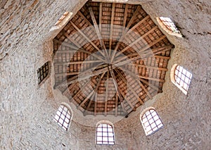 Low angle shot of a ceiling of the Euphrasian Basilica with beautiful arch in Porec, Croatia