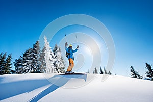 Skier resting on top of the mountain