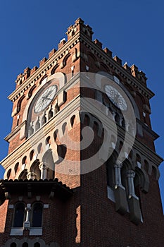 Low-angle shot of the clock tower of Usina del Arte cultural center in Argentina photo
