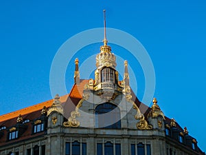 Low angle shot of the Commerzbank AG building in Leipzig, Germany on a clear blue sky backgrou