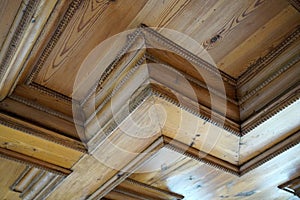 Low angle shot of the design of the wooden beams on the ceiling of a new home