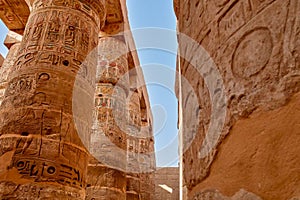 Low-angle shot of the detail of the columns with closed papyriform capitals in  Karnak temple, Egypt