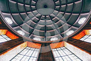 Low angle shot of a dome ceiling with glass windows