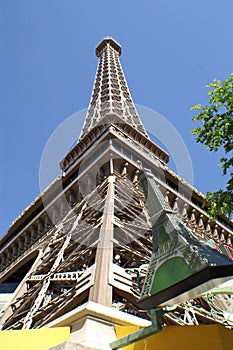 Low angle shot of the Eiffer Tower in Paris under clear cloudless sky